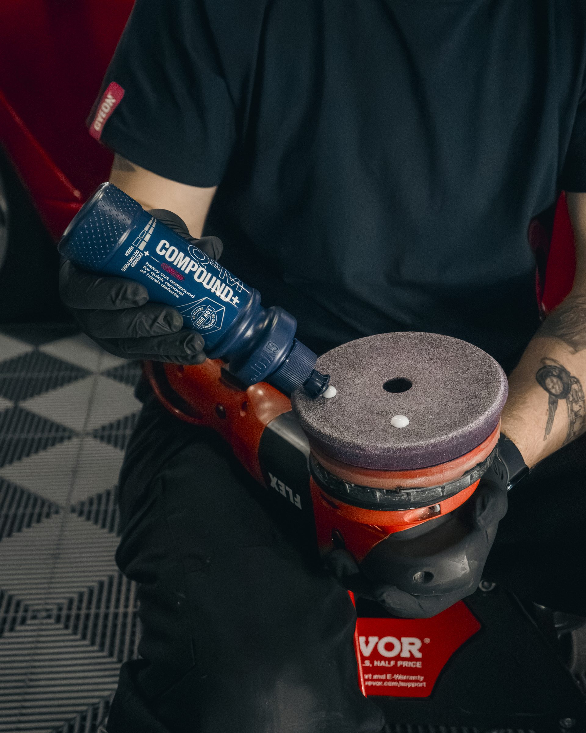 Dan, our GYEON certified detailer, machine polishing a classic car